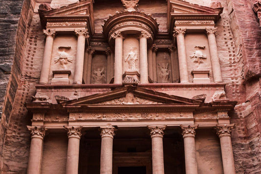 The Treasury carved into the rock face in Petra, Jordan